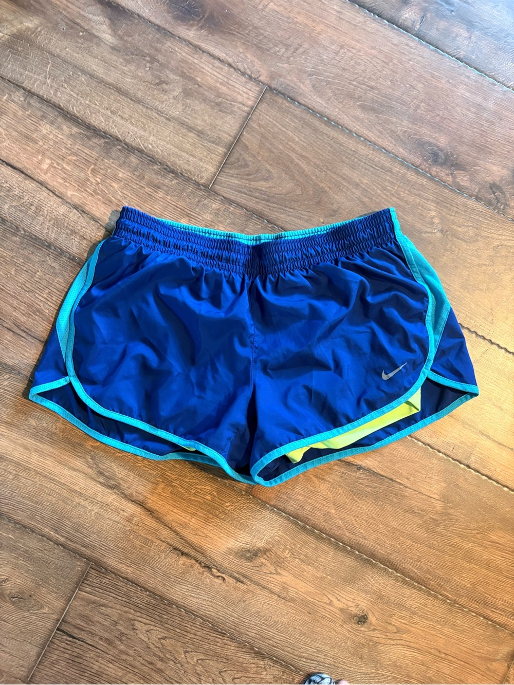 Nike Women's Royal Blue Athletic Shorts with Teal Trim